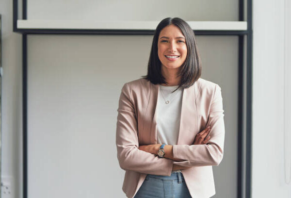 Cropped portrait of an attractive young businesswoman standing alone in her office with her arms folded during the day